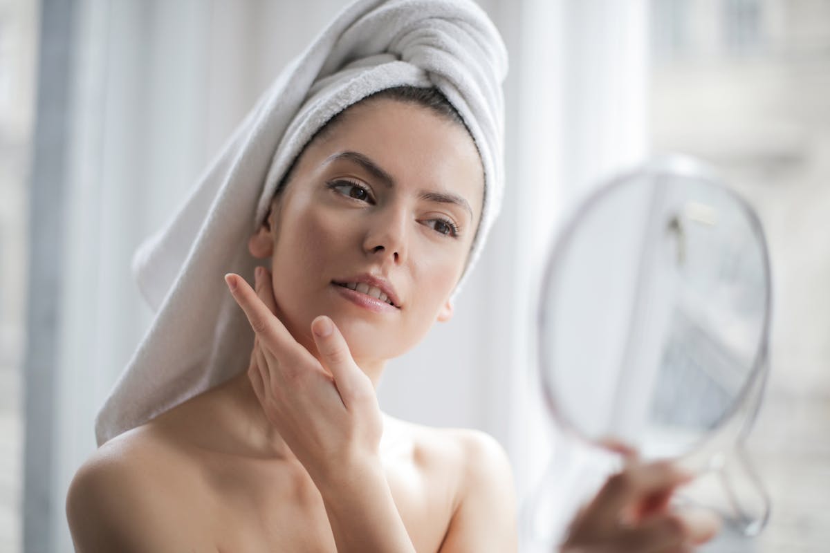 Precise eyebrow threading and shaping service.
